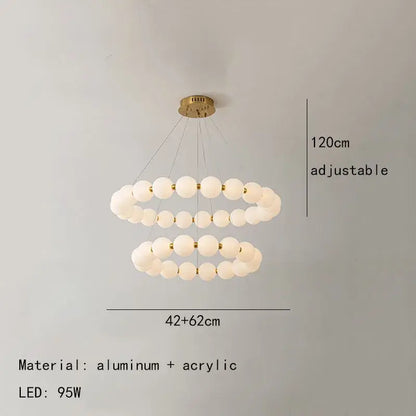 Modern brass led pendant light with frosted spheres for living room
