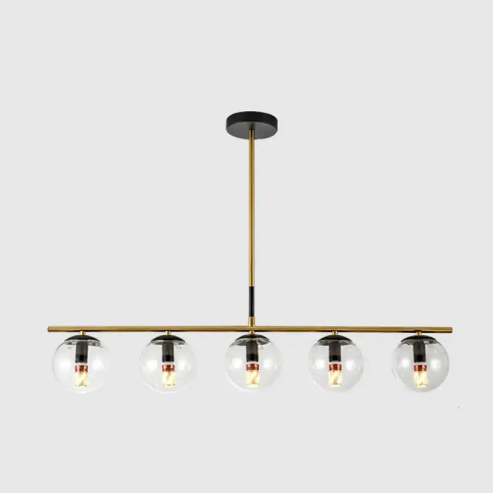 Modern brass & smoke grey globe chandelier kitchen island light