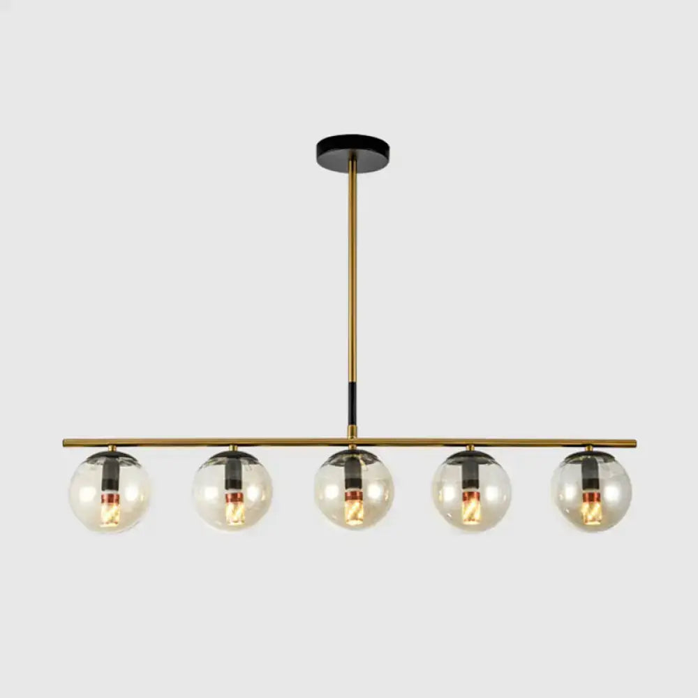 Modern brass & smoke grey globe chandelier kitchen island light