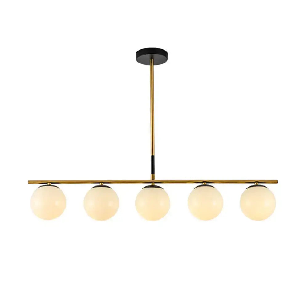 Modern brass & smoke grey globe chandelier kitchen island light