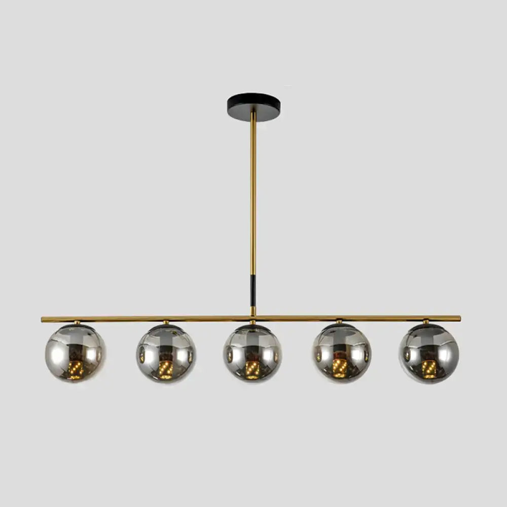 Modern brass & smoke grey globe chandelier kitchen island light