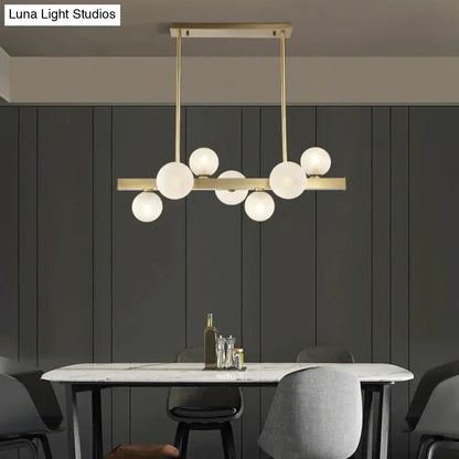 Modern brass spherical glass island ceiling light for kitchen dining