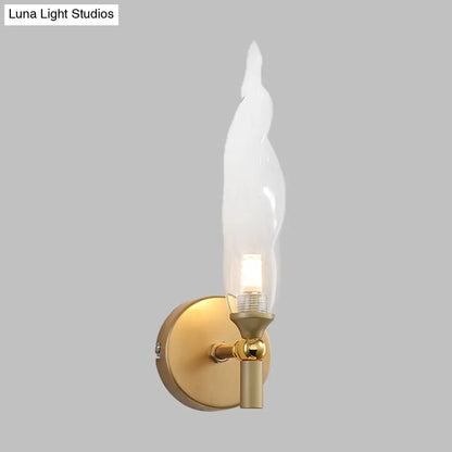 DecorBites™ Modern Brass Torch Sconce: LED Wall Mount Lamp with Clear Glass - Bedside Lighting