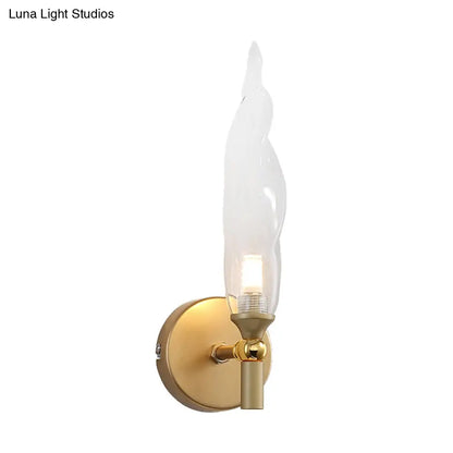 DecorBites™ Modern Brass Torch Sconce: LED Wall Mount Lamp with Clear Glass - Bedside Lighting