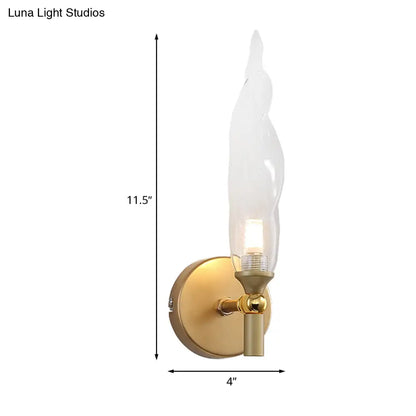 DecorBites™ Modern Brass Torch Sconce: LED Wall Mount Lamp with Clear Glass - Bedside Lighting
