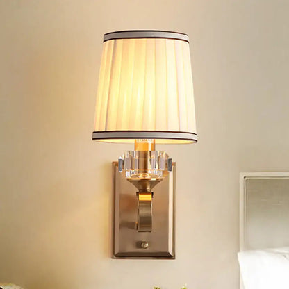 Modern brass wall lamp – bedroom sconce with pleated shade