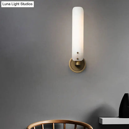Modern brass wall lamp with opal glass shade bedroom sconce