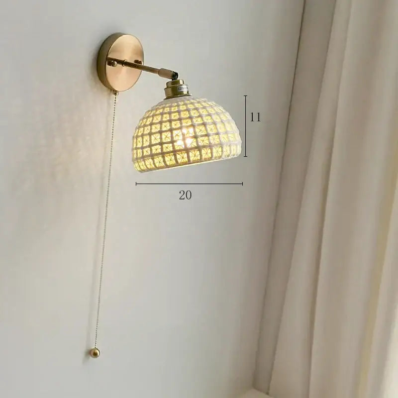 Modern brass wall lamp with ribbed glass shade – bedroom reading light