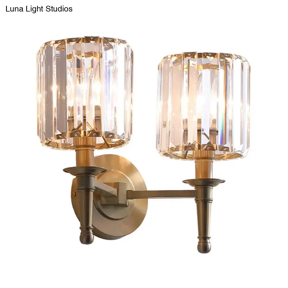 Modern brass wall light sconce with crystal shade for bedroom