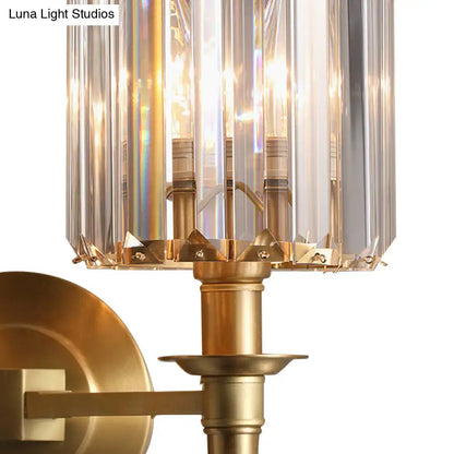 Modern brass wall light sconce with crystal shade for bedroom