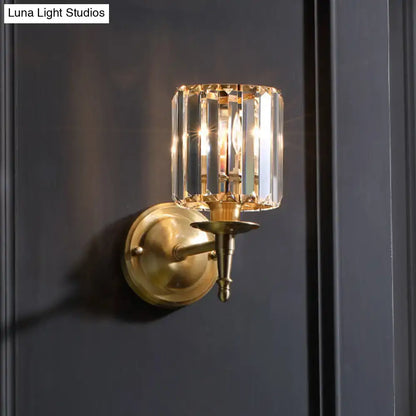 Modern brass wall light sconce with crystal shade for bedroom