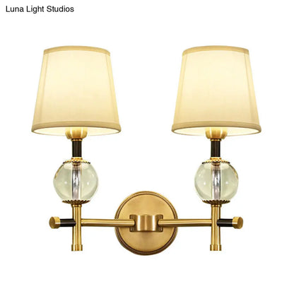 DecorBites™ Modern Brass Wall Sconce with Crystal Accent and Fabric Shade