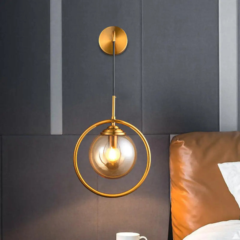 DecorBites™ Modern Brass Wall Sconce with Glass Sphere Shade for Bedside Lighting