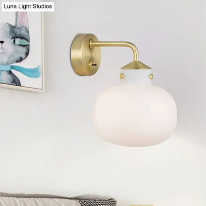 Modern brass wall sconce with oblong milk white glass shade balcony light