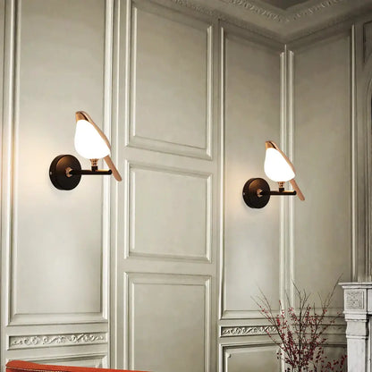 Modern bronze bird wall light pair – living room warm glass sconces