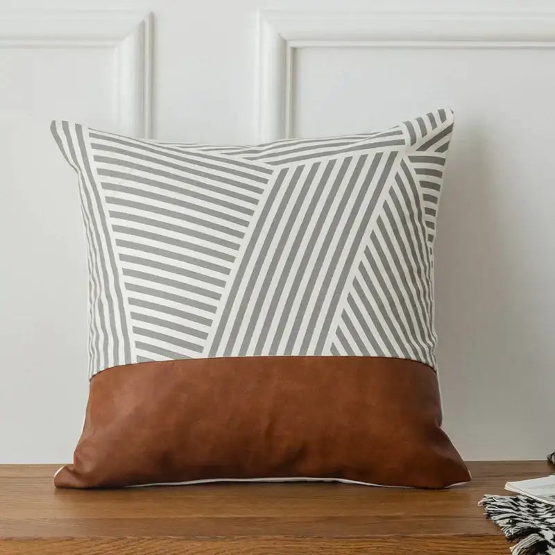 Modern brown faux leather and geometric pillow cover living room