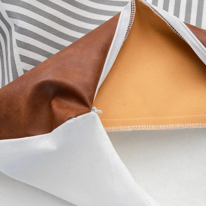 Modern brown faux leather and geometric pillow cover living room