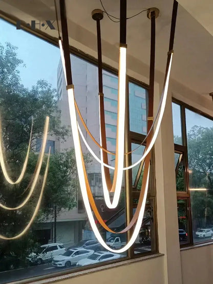Modern brown & white designer belt light dining room