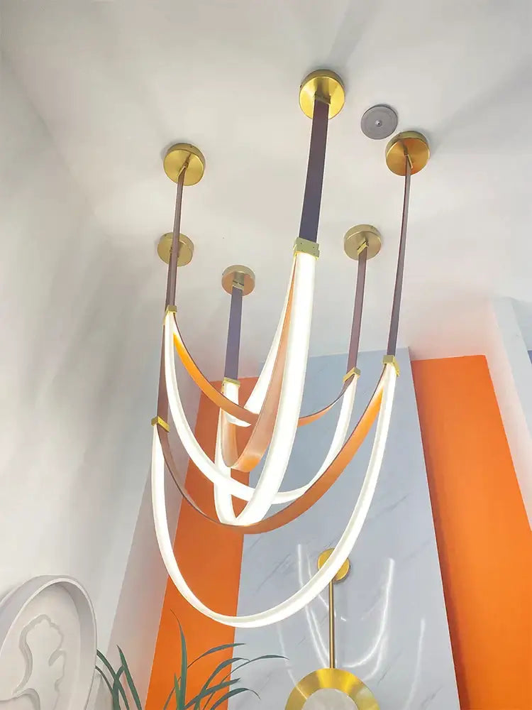 Modern brown & white designer belt light dining room