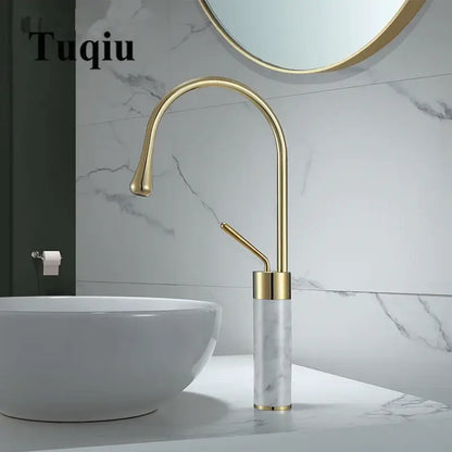Modern brushed gold and marble bathroom sink faucet