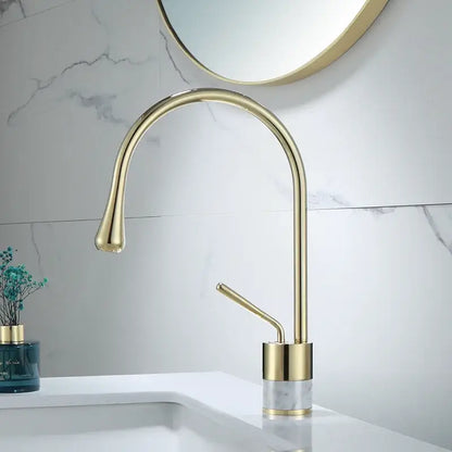 Modern brushed gold and marble bathroom sink faucet