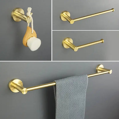 Modern brushed gold bathroom hardware set with glass soap dish