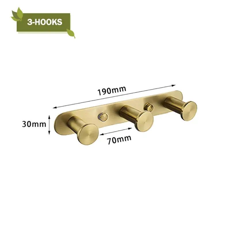 Modern brushed gold bathroom hardware set with glass soap dish
