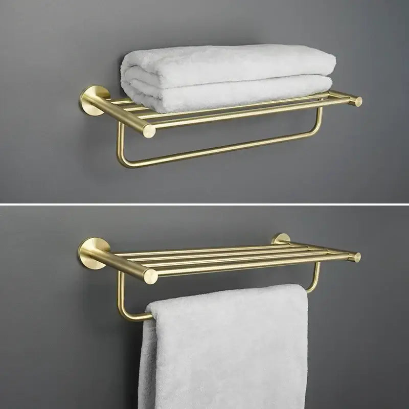 Modern brushed gold bathroom hardware set with glass soap dish