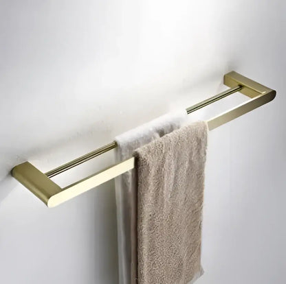 Modern brushed gold bathroom hardware set with shelf and phone holder