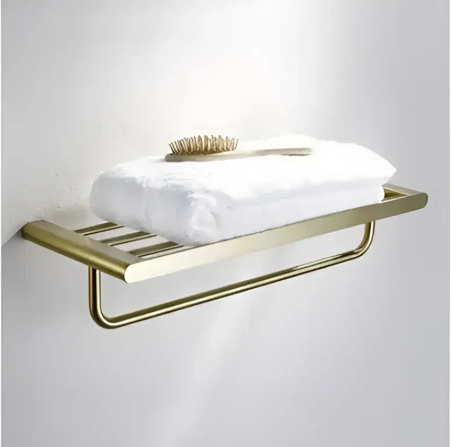 Modern brushed gold bathroom hardware set with shelf and phone holder