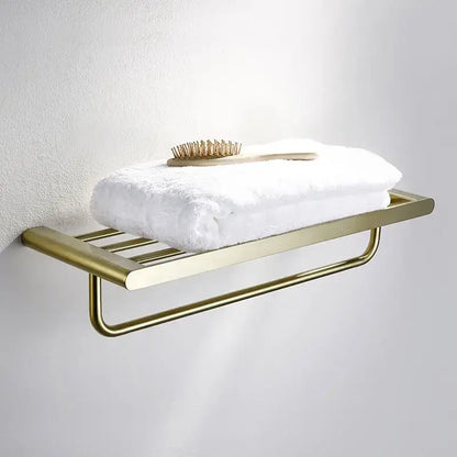 Modern brushed gold bathroom hardware set with shelf and phone holder