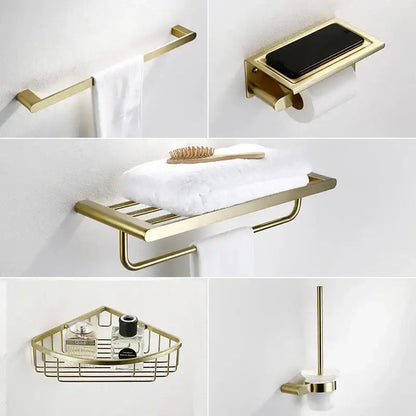 Modern brushed gold bathroom hardware set with shelf and phone holder
