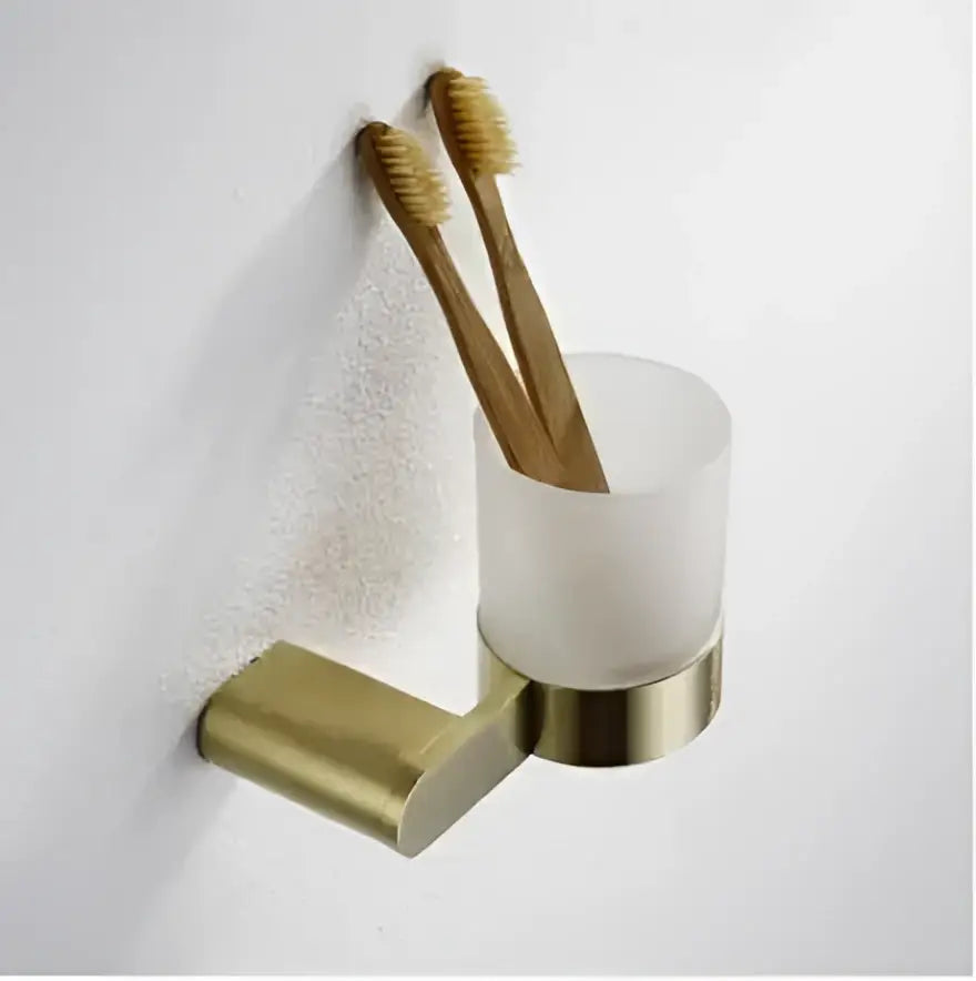 Modern brushed gold bathroom hardware set with shelf and phone holder
