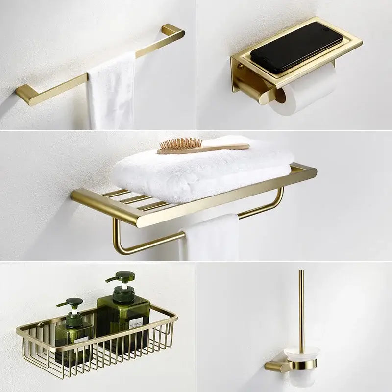 Modern brushed gold bathroom hardware set with shelf and phone holder