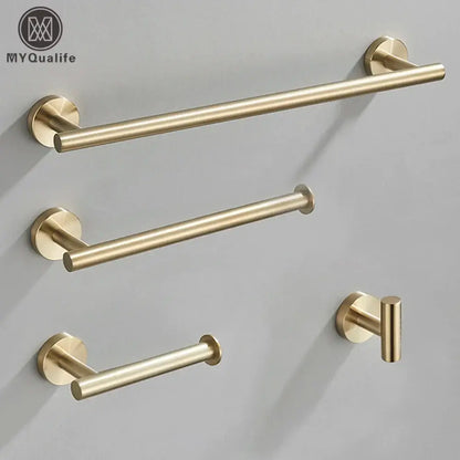 Modern brushed gold bathroom hardware set with towel bar and hooks