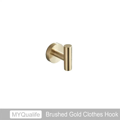 Modern brushed gold bathroom hardware set with towel bar and hooks
