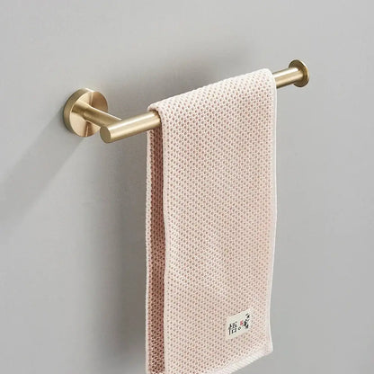 Modern brushed gold bathroom hardware set with towel bar and hooks