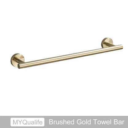 Modern brushed gold bathroom hardware set with towel bar and hooks