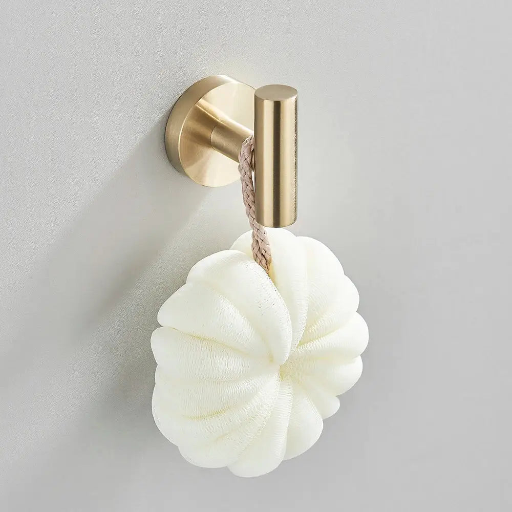 Modern brushed gold bathroom hardware set with towel bar and hooks