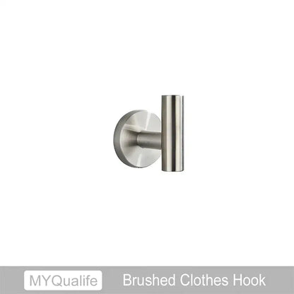 Modern brushed gold bathroom hardware set with towel bar and hooks