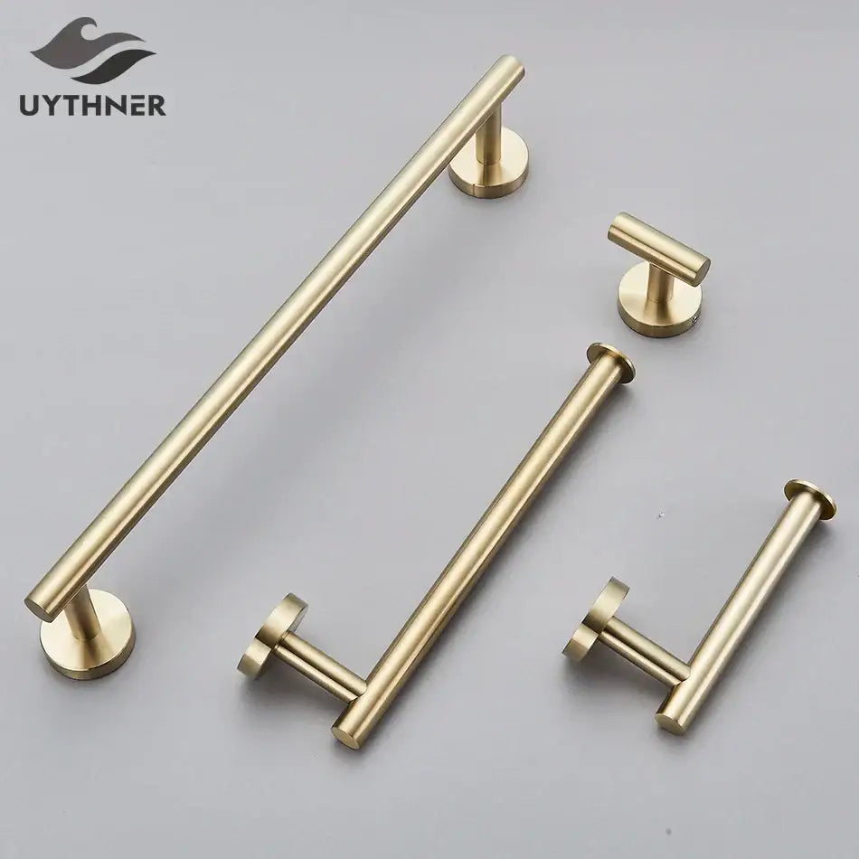 Modern brushed gold bathroom hardware set with towel rack and hooks