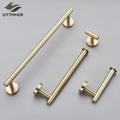 Modern brushed gold bathroom hardware set with towel rack and hooks