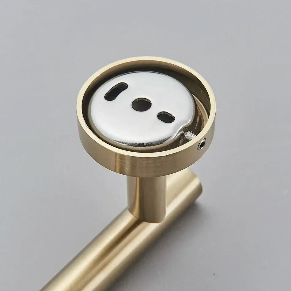 Modern brushed gold bathroom hardware set with towel rack and hooks