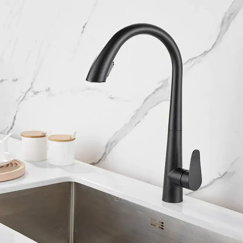 Modern brushed gold kitchen sink faucet with pull out spring spout