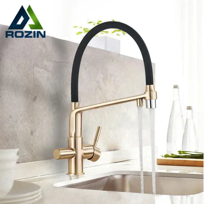 Modern brushed gold swivel kitchen faucet with black rubber hose