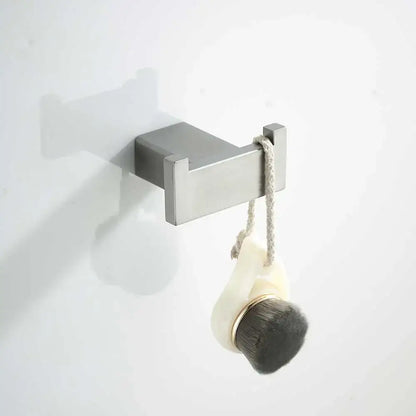 Modern brushed nickel bathroom hardware set with glass accents