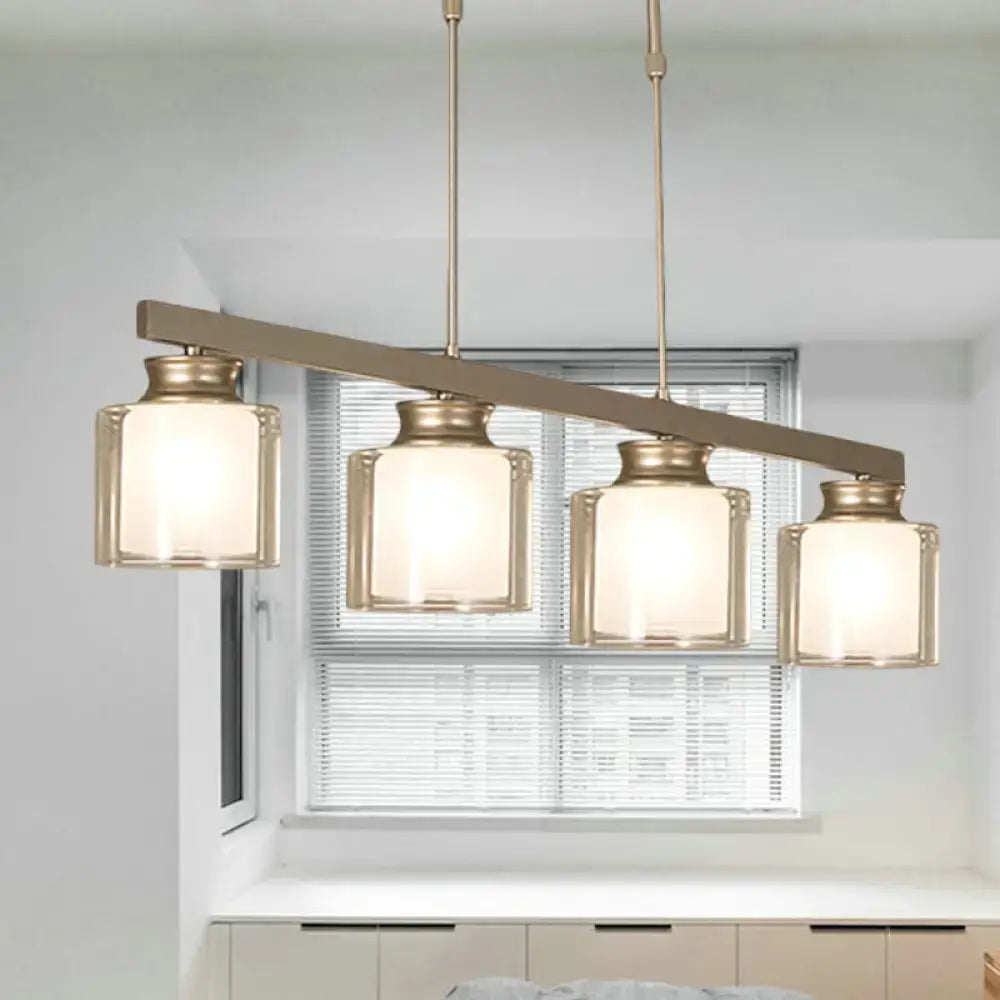 Modern brushed nickel pendant light with clear glass shade dining room