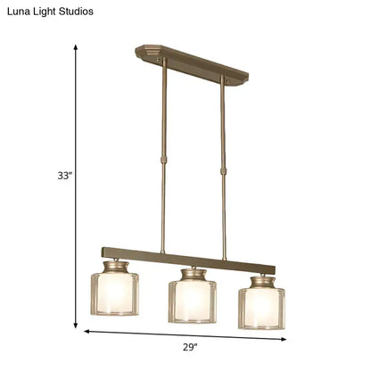 Modern brushed nickel pendant light with clear glass shade dining room