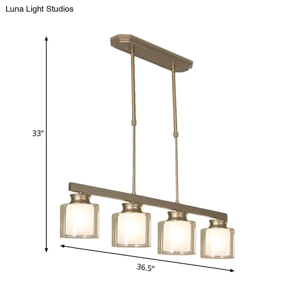 Modern brushed nickel pendant light with clear glass shade dining room