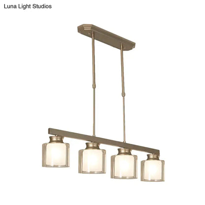 Modern brushed nickel pendant light with clear glass shade dining room